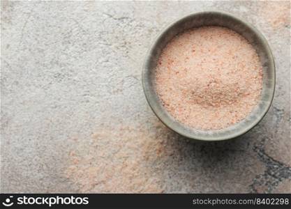 Bowl of himalayan pink salt .  Healthy food concept. Speciality salt.