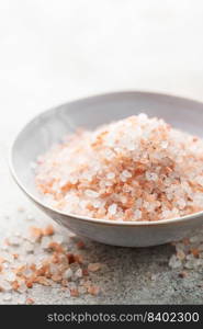 Bowl of himalayan pink salt .  Healthy food concept. Speciality salt. 