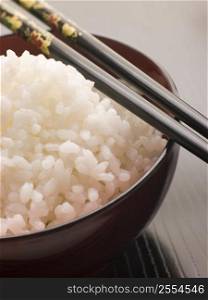 Bowl of Koshihikari Rice with chop sticks