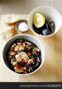 Bowl of mussels with capsicum salad