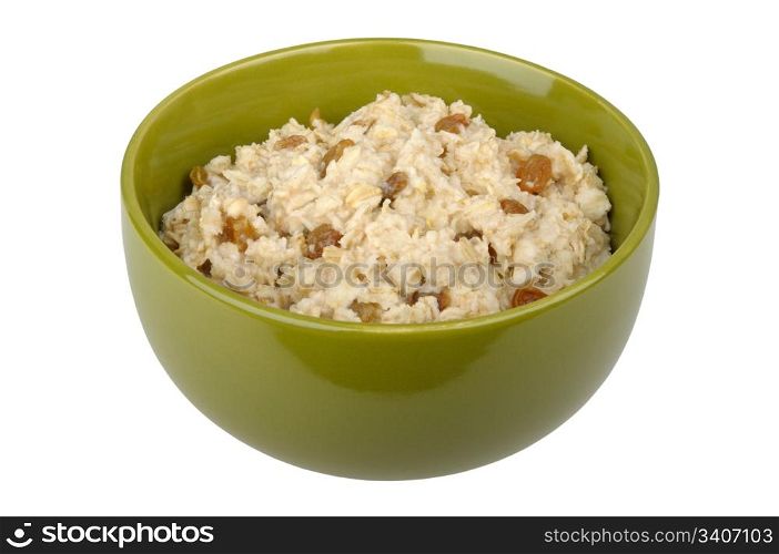 Bowl of oatmeal cereal with raisins isolated on white background