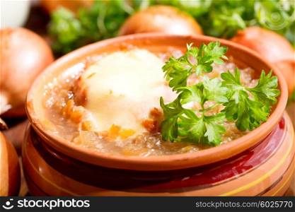 bowl of onion soup on wooden table