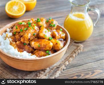 Bowl of orange chicken with white rice