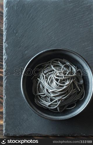 Bowl of pasta with squid ink