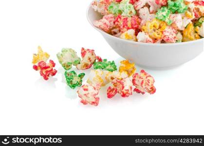 Bowl of popcorn on white reflective background.