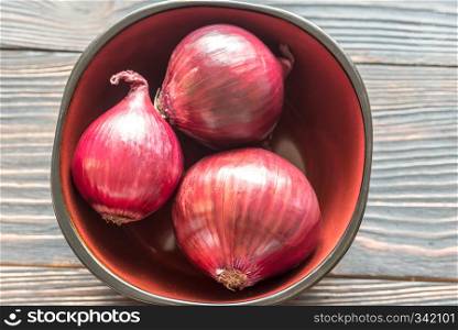 Bowl of red onions