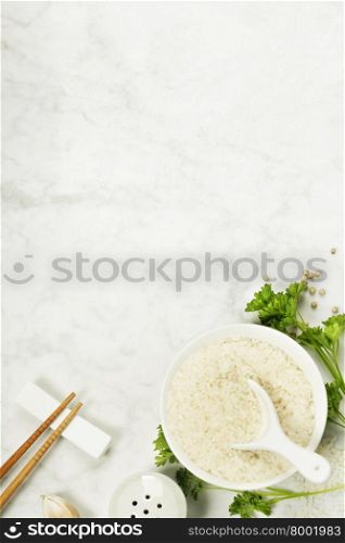 Bowl of rice and chopsticks - asian food concept