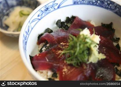 Bowl of rice topped with tuna
