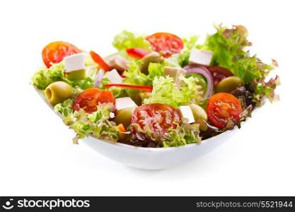bowl of salad with vegetables and greens on white background