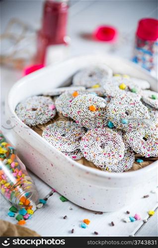 Bowl of sprinkled holiday cookies on a party table. Bowl of sprinkled holiday cookies