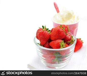 Bowl of strawberries with whipped cream