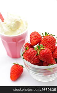 Bowl of strawberries with whipped cream