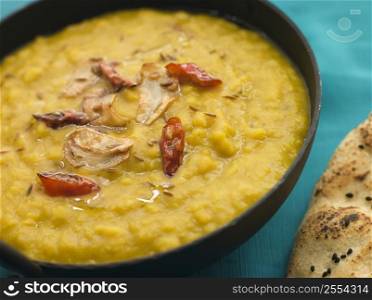 Bowl of Tarka Dal with Naan Bread