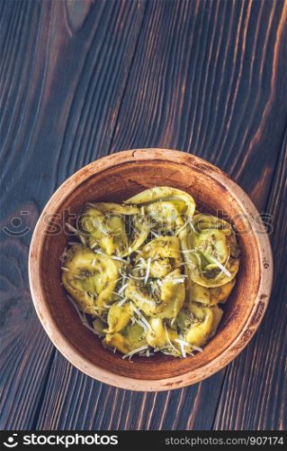 Bowl of tortelloni stuffed with ricotta with pesto