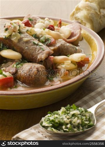 Bowl of Toulouse Sausage and Butter Bean Ragout with Persillade