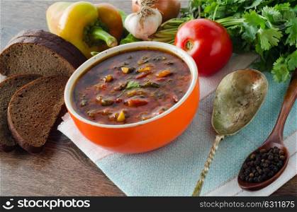 Bowl of traditional soup Borscht on table. The bowl of traditional soup borscht on table