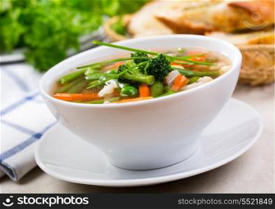 bowl of vegetable soup with parsley