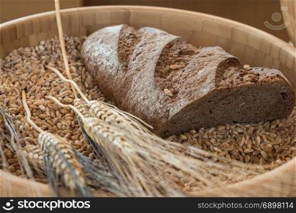 Bowl of Wheat Grains, Flour and Bread - Whole Grain Wheat Kernels