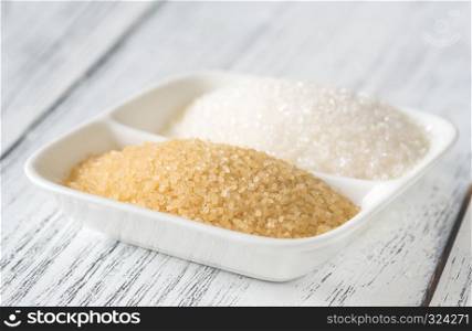 Bowl of white and brown sugar