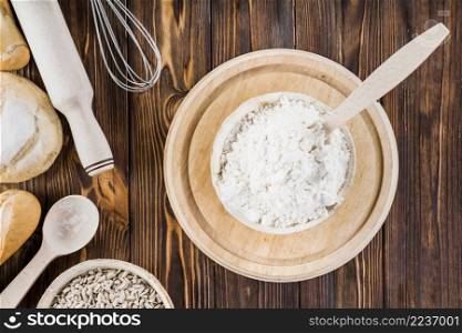 bowl white flour wooden plate table