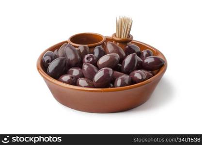 Bowl with black Calamata olives on white background