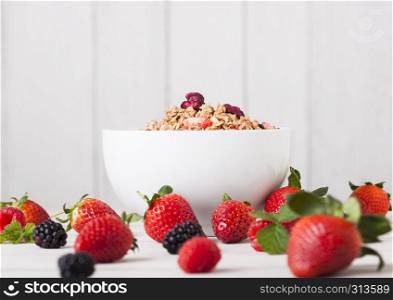 Bowl with breakfast cereal and fresh berries.Healthy summer breakfast