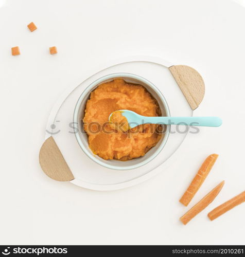 bowl with carrot baby puree