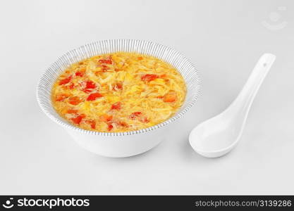 bowl with delicious egg soup . Chinese cuisine