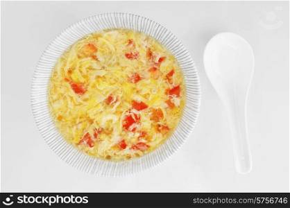 bowl with delicious egg soup . Chinese cuisine