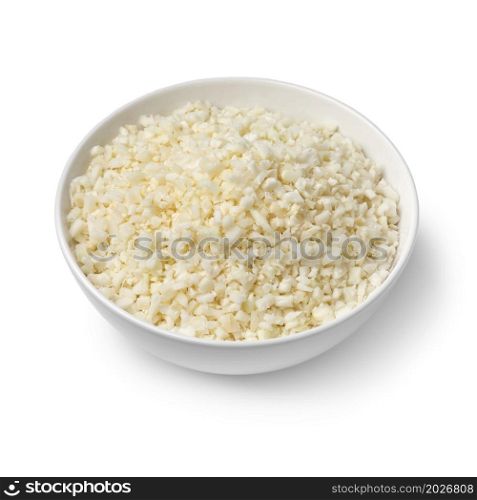 Bowl with fresh raw cauliflower rice isolated on white background