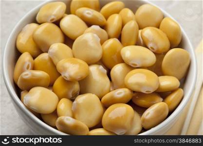Bowl with pickled yellow lupin beans
