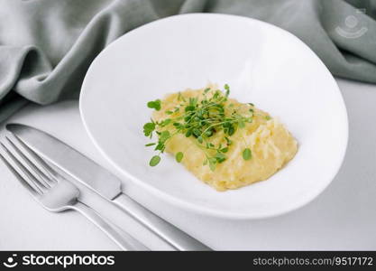 Bowl with tasty mashed potatoes on top view