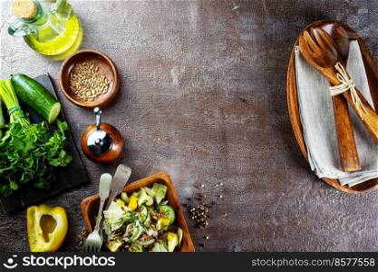 Bowl with tasty vegetable salad on stone table