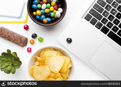 bowl with unhealthy snacks