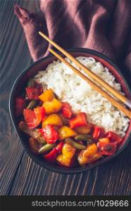 Bowl with white rice and caramelized vegetables