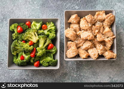 Bowls of broccoli and chicken stir-fry