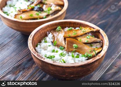 Bowls of rice with teriyaki king oyster mushrooms