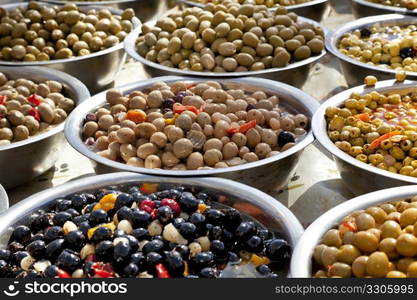 Bowls with different kind of olives