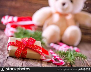 box for present and christmas decoration on a table