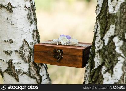 box for wedding rings between the birches
