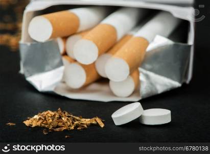 Box of cigarettes.Close up black isolated studio shot