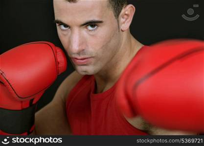 Boxer on black background