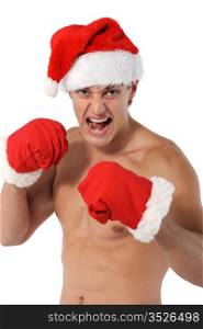 boxer Sexy muscular man wearing a Santa Claus hat isolated on white