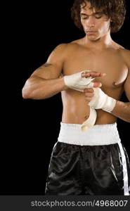 Boxer tying bandage