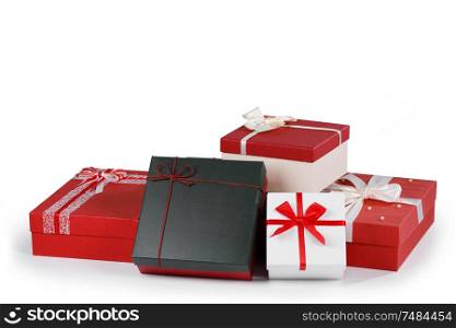 Boxes with gifts tied with ribbons and bows isolated on white background. Boxes with gifts on white