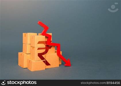 Boxes with indian rupee symbol and down arrow. Decrease in stocks of products. The fall in the production of goods. Sanctions. Low consumption. Economic slowdown. Price reduction. Worsening trade.