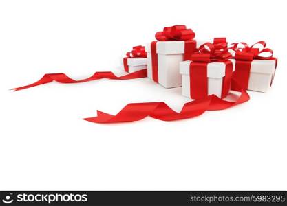 Boxes with presents wrapped in white paper with red ribbons, isolated on white