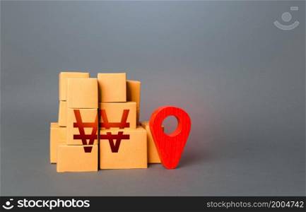 Boxes with south korean won symbol and red location pin. Import export. Trade in goods. Domestic manufacturer. Supply distribution of goods. Transportation delivering logistics, warehouse management.