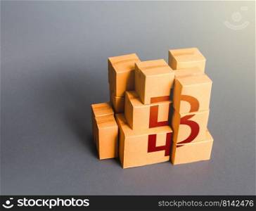 Boxes with thai baht symbol. Manufacturing industry and trade. Retail of products. Consumption economics, imports exports. Gross Domestic Product, GDP. Distribution of goods. Transportation logistics.