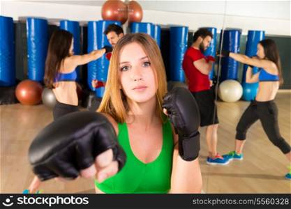 Boxing aerobox blond woman portrait in fitness gym training workout